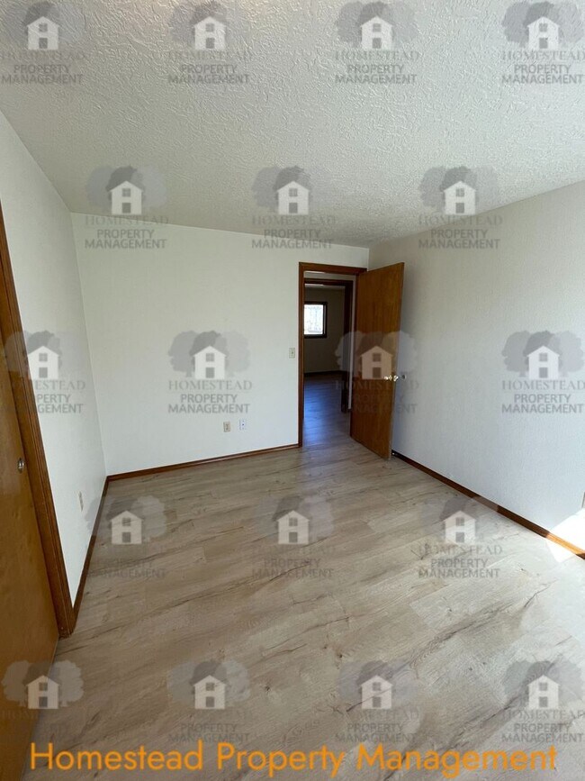 Building Photo - Celebrate the new year with 1/2 off one months rent!