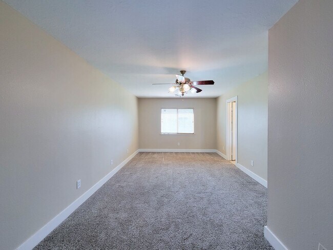 Building Photo - 3 bedroom one story home on large corner lot. Home has hard flooring throughout living areas and ...