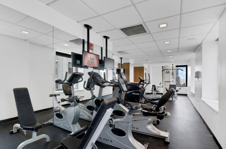 Gym Included, Free laundry in building. - 100 W 39th St