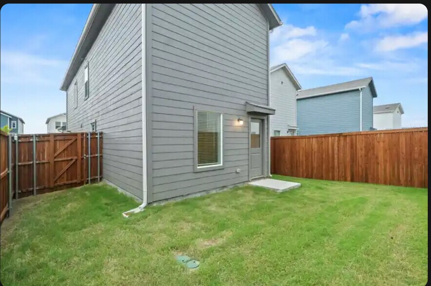 Back of the home - 726 Sandhill Crane Ln