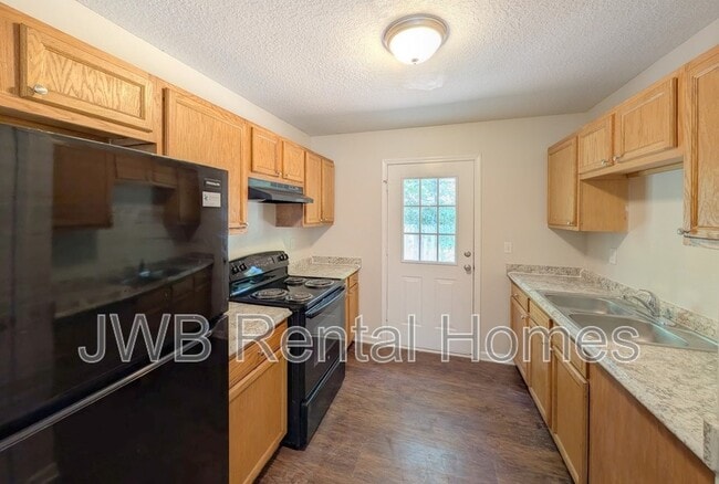 Building Photo - 7730 Eaton Ave