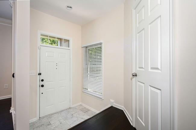 Building Photo - Spacious Bright and Beautiful End Unit Tow...