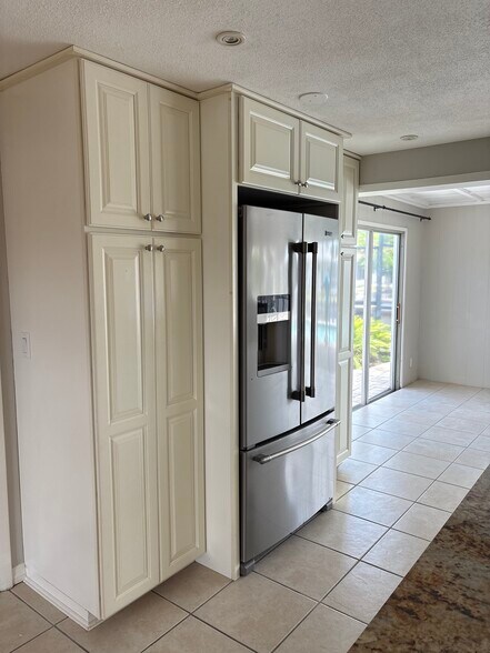 Kitchen also has 2 pantries built into both sides of the fridge. - 4332 S Atlantic Cir