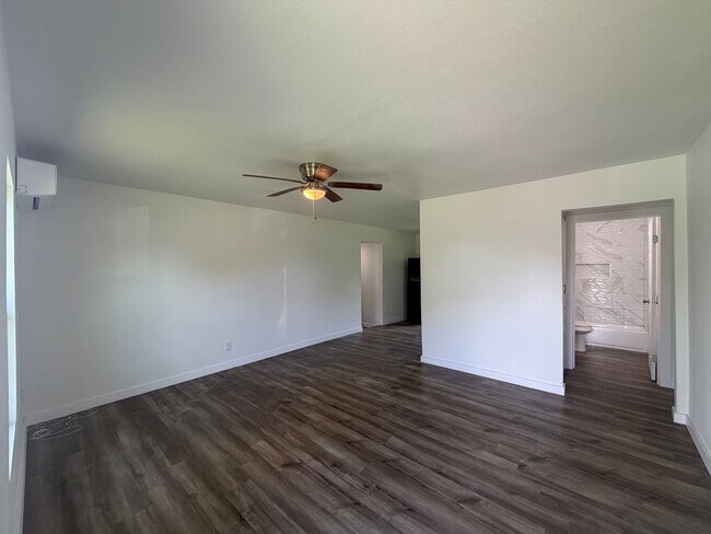Building Photo - THREE BEDROOM ONE BATH