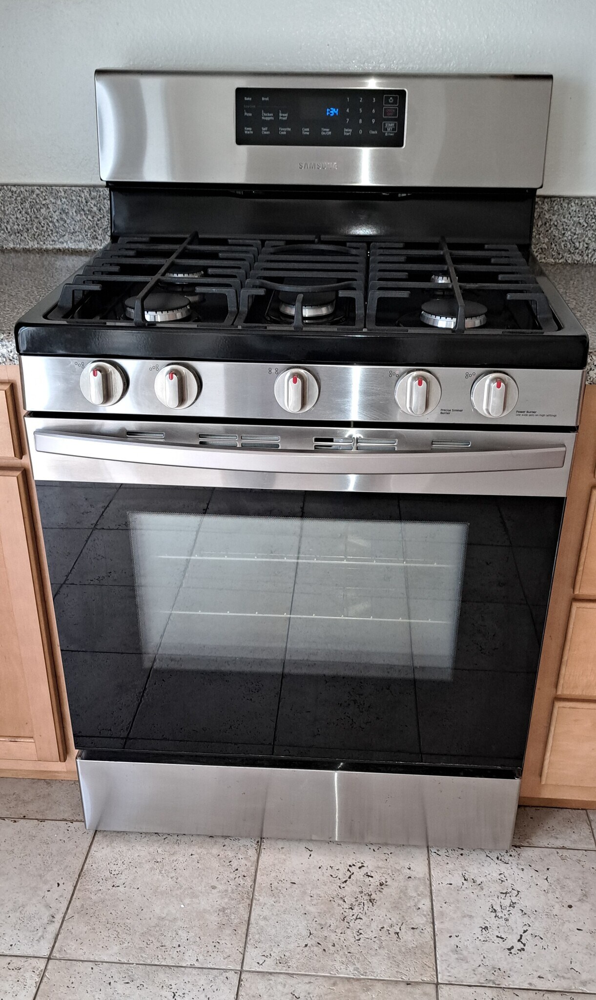 5-burner natural gas range and oven. - 314 20th St