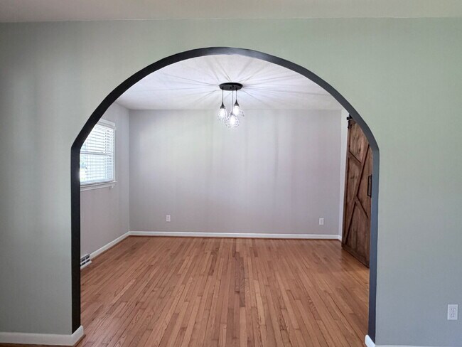 Building Photo - Updated 3BR Home in Beaver Lake | Fenced Yard, Garage, Covered Porch & Outdoor Fireplace | Pet Fr...