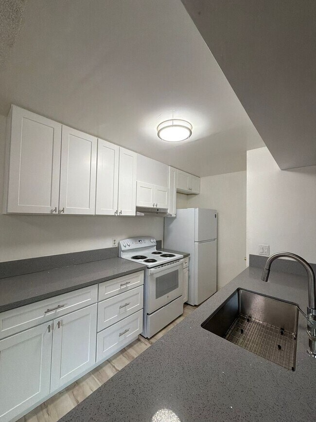 Building Photo - 2-Story Condo With Lots of Character!