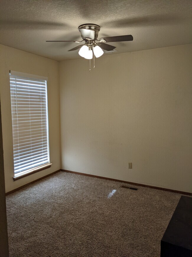 Bedroom 2 with new light/fan fixture - 1618 Julie Plz