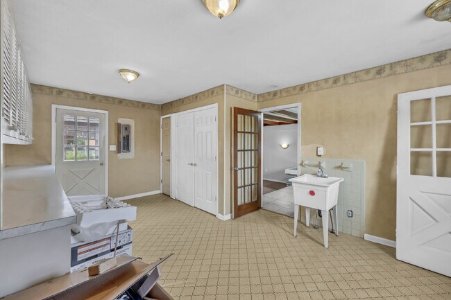 Building Photo - spacious 4-bedroom, 2.5-bath home featuring a 2-car garage and fresh updates throughout.