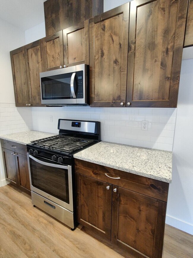 Building Photo - Contemporary Townhome with Open Floor Plan...