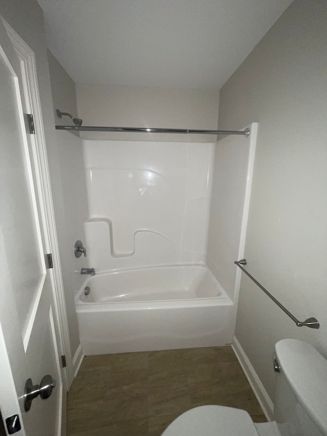 Building Photo - Marion Gardens Townhomes - New Baldwinsville Development