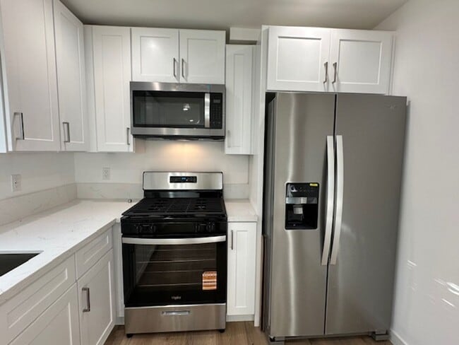 Building Photo - Completely remodeled and located on a quie...