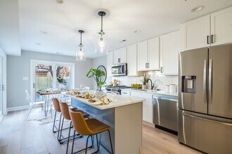 Building Photo - Natural-Light Stunner Near Eastern Market & Potomac Metro