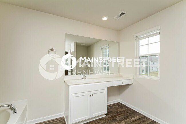 Building Photo - 4 Bedroom Pet-Friendly Home in Zebulon, NC with Main Street Renewal