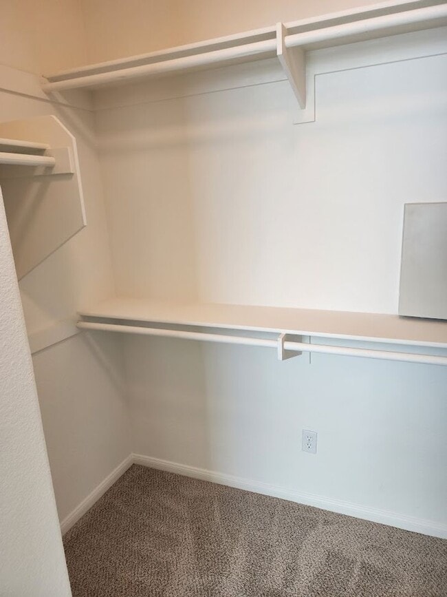 Building Photo - Two Story 3 Bedroom Townhome with 2 Car Garage in Gated Community