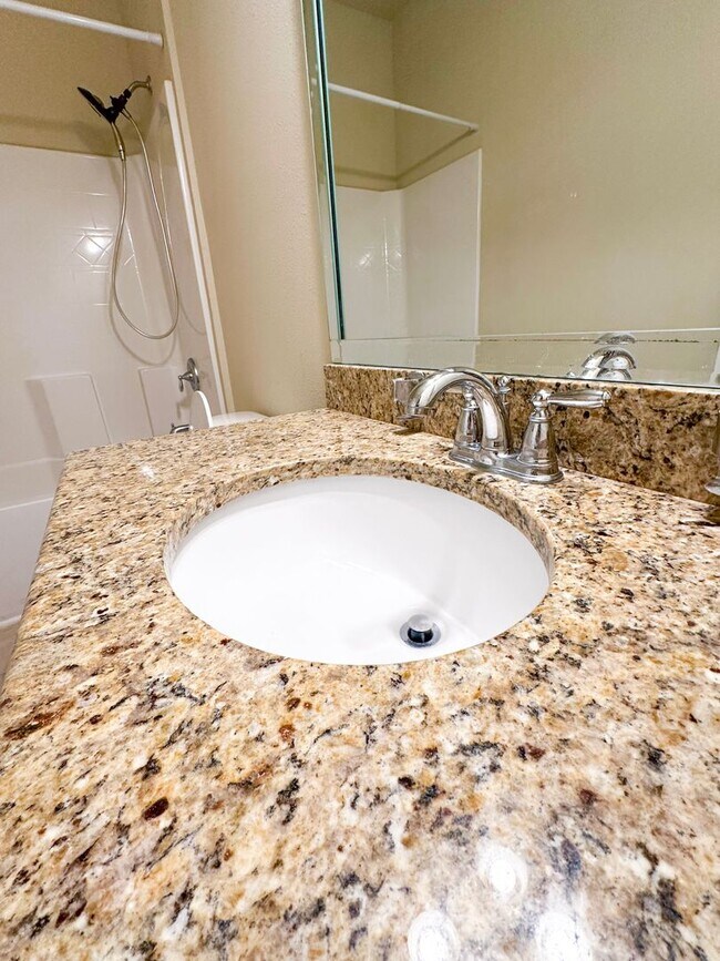 Building Photo - Well maintained 4 bedroom home with 2 car garage