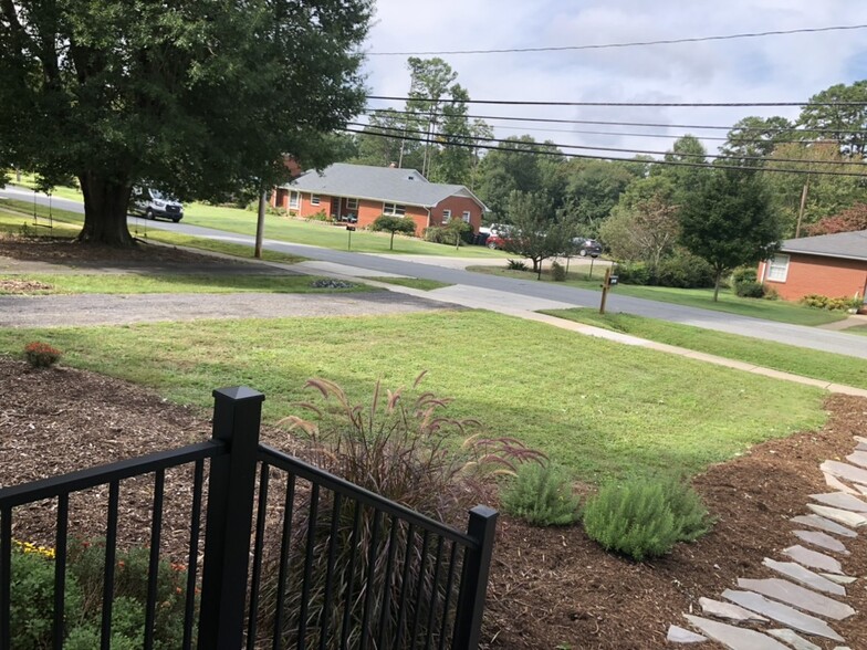 View from front porch toward quiet street. Large maintained lot. - 20400 Church St