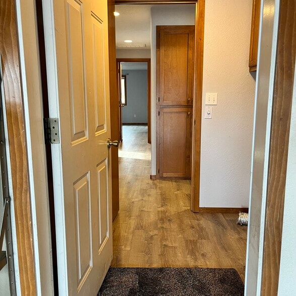 Entry through garage, laundry room- - 107 Applewood Dr