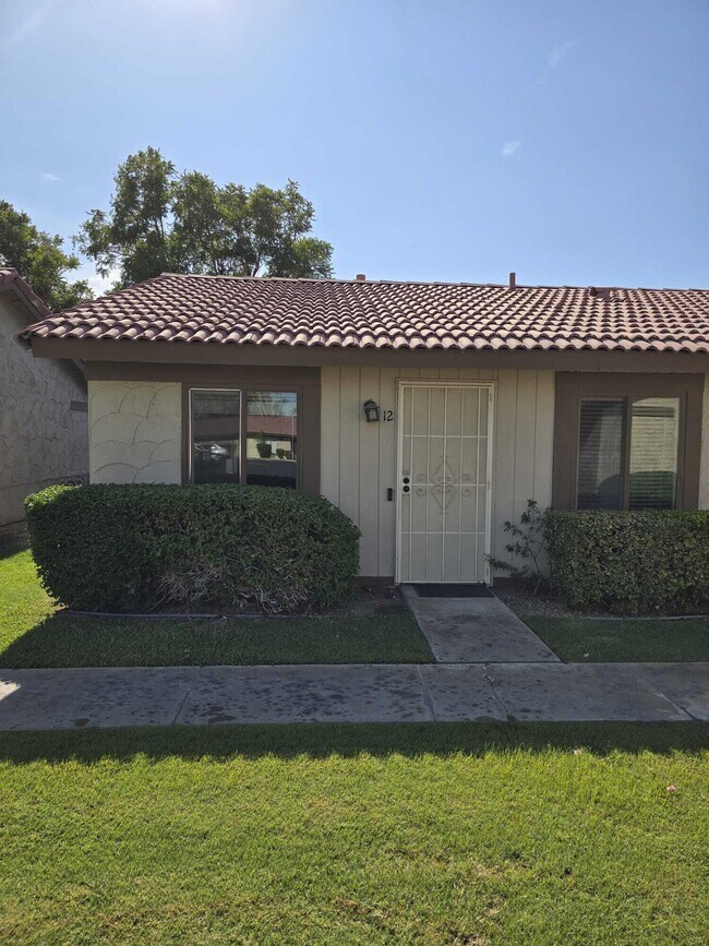 Building Photo - 82075 Country Club Dr