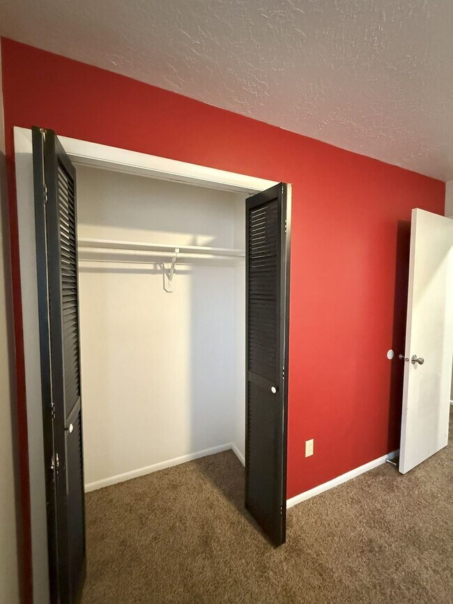 Building Photo - Spacious Comfort Meets Practical Living in...