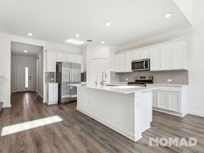 Building Photo - 4 Bedroom, 3 Bathroom Single Family Home i...