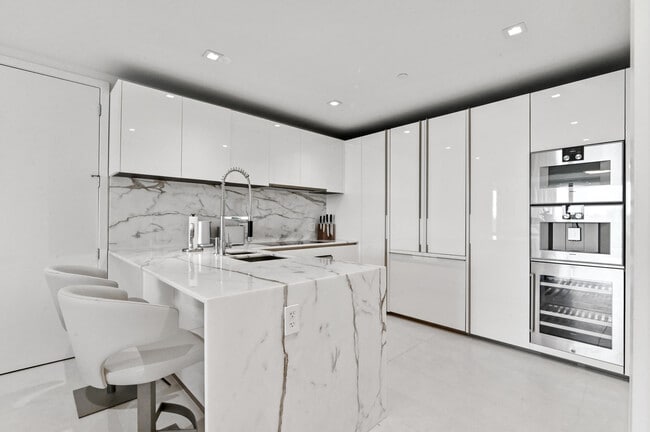 Building Photo - 10203 Collins Ave