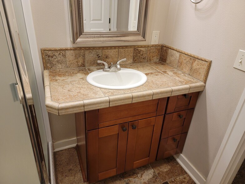 Bathroom sink/ cabinet - 1578 S Alpine St