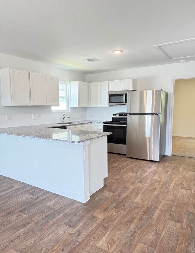 Building Photo - 16527 Jasmine Marie Pl