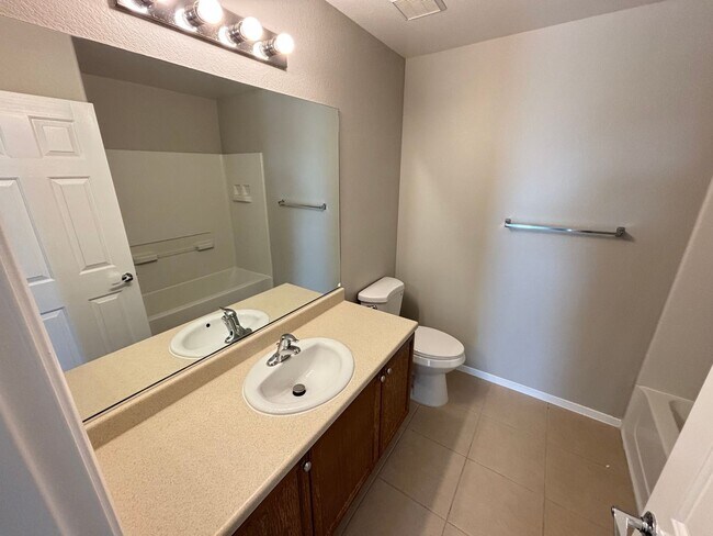 Building Photo - Spacious Tri-Level 4-Bedroom Home with Balcony and Community Amenities in Northwest Las Vegas!