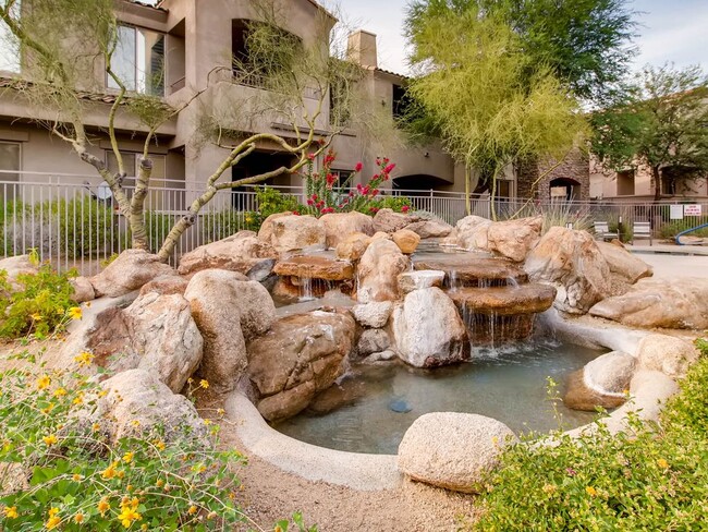 Clubhouse pool rock waterfall - 19475 N Grayhawk Dr