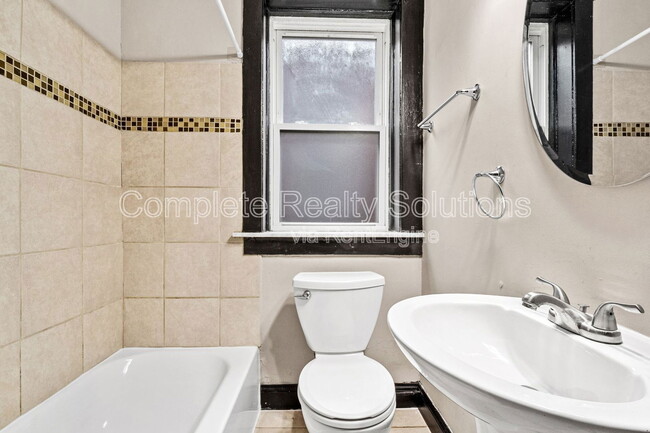 Building Photo - 3001 S Compton Ave