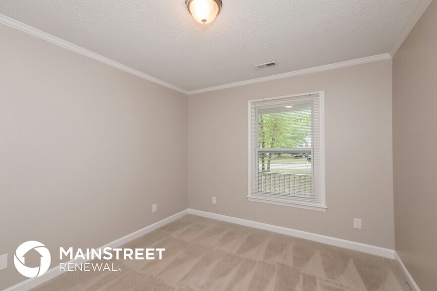 Building Photo - 5312 River Falls Dr