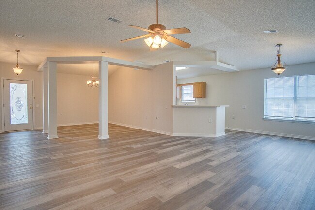 Building Photo - Lakefront Living in Gulf Breeze – Spacious...