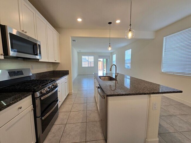 Building Photo - Beautiful Kiley Ranch Home with Open Floor Plan & Private Backyard
