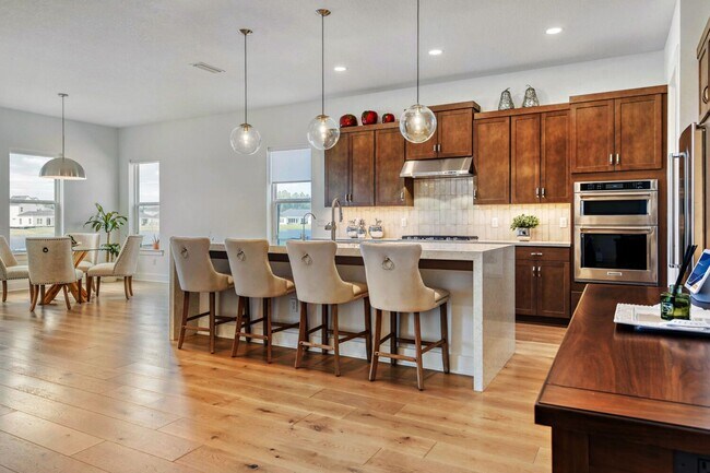 Building Photo - Resort-Style Furnished Lakefront Living in SilverLeaf | 100” Theater & Golf Cart Included