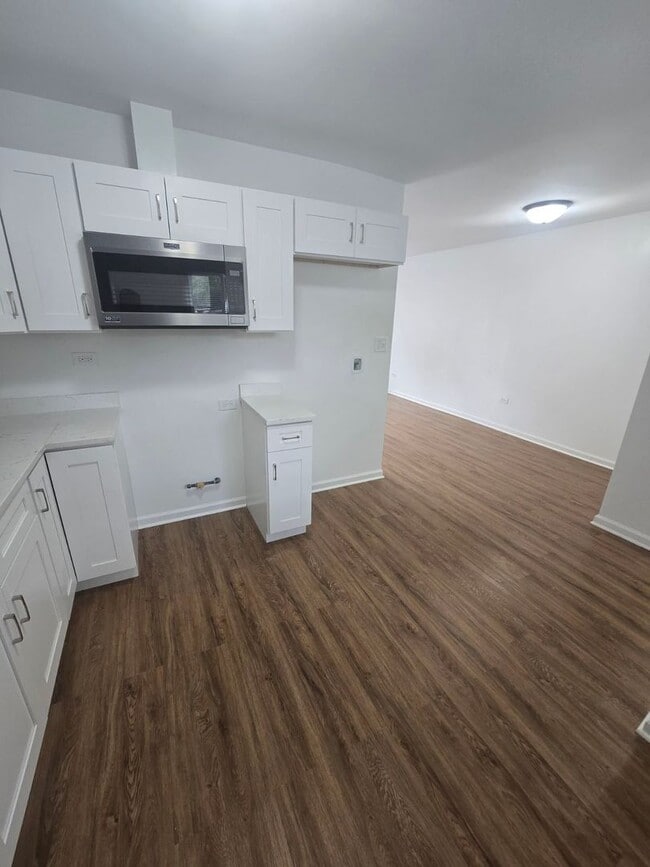 Building Photo - Rehabbed Home with Fenced Back Yard