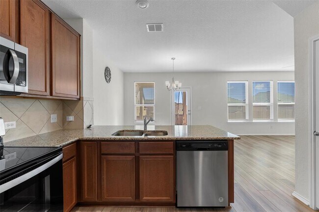 Building Photo - 7705 Song Sparrow Dr.