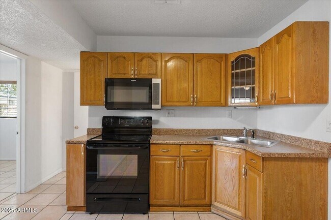 Building Photo - 6713 N 63rd Ave