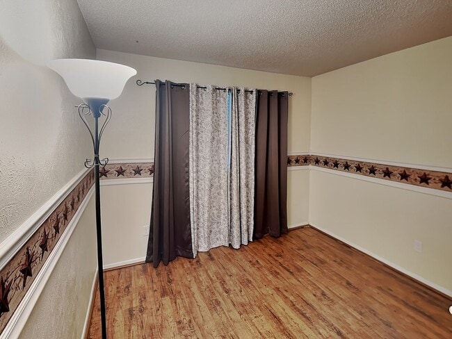 Building Photo - Charming One-Story with Bonus Sunroom & Backyard Retreat in Prime Summerfields Location!