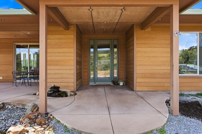 Building Photo - Peaceful Hilltop Retreat with Views | Unfurnished 5BD Executive Home on Private Knoll