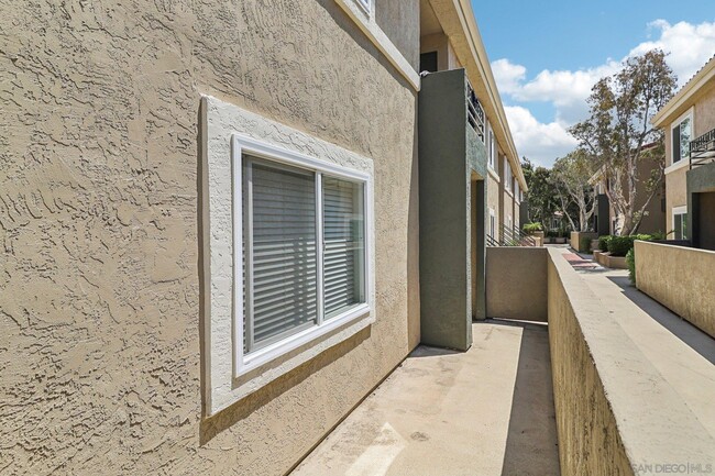 Building Photo - 7565 Charmant Dr