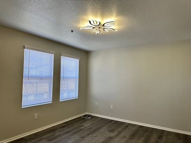 main bedroom with big windows - 1715 Paseo Aurora