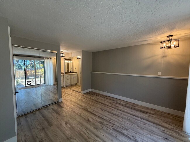 Building Photo - Spacious 4BR/3BA Home with Deck, Fenced Yard & Garage