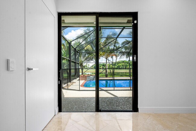 Building Photo - 10391 Boca Woods Ln