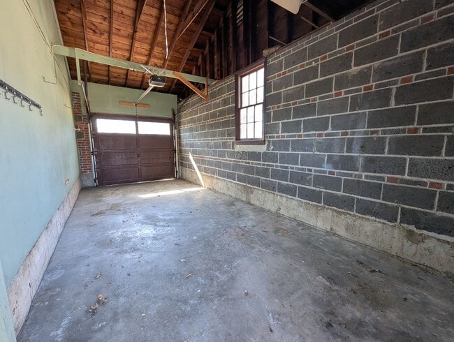 Building Photo - Fully Renovated Home with Sunroom, Garage & Huge Fenced Yard