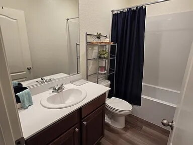 Building Photo - This stunning three-bedroom, two-bathroom home offers an incredible amount of space and upgrades,...
