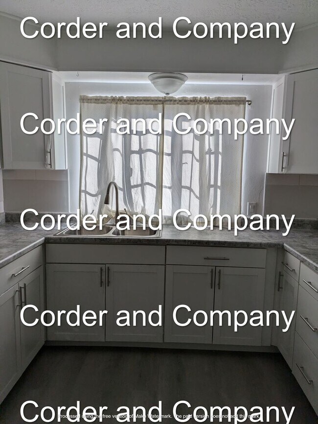 Building Photo - 211-1211 Adams St NE