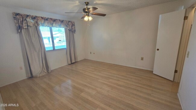 Building Photo - 9839 W Cedar Dr