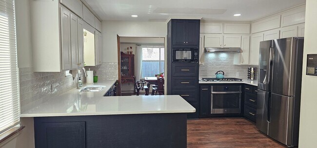 Building Photo - Contemporary Ranch in a beautiful, quiet s...