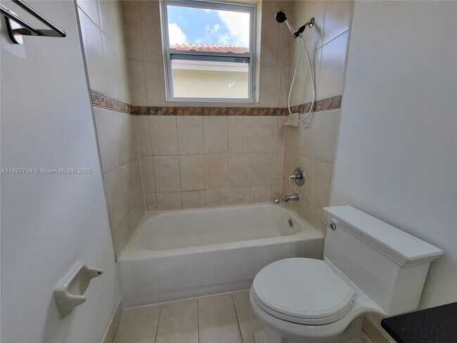Building Photo - 4949 SW 134th Ave